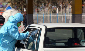 فیلم | سنجش تب سرنشینان خودروها در عوارضی تهران - قم