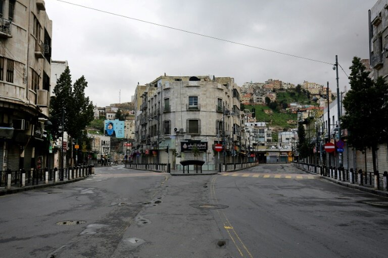 خیابان خلوت در شهر امان پایتخت اردن بعد از اعمال مقررات منع آمد و شد -  خبرگزاری فرانسه - خلیل مزرعاوی