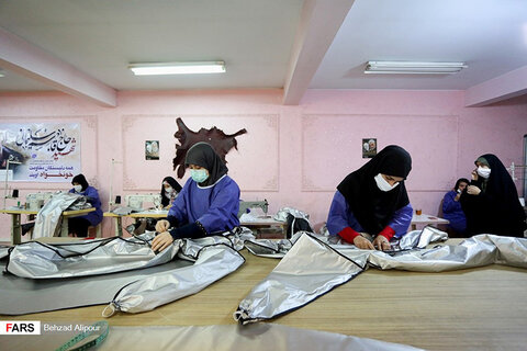 کارگاه تولید لباس محافظ پزشکی در همدان