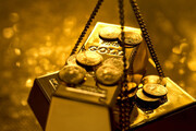 قیمت جهانی طلا تحت تأثیر بازگشت ارزش دلار افت کرد