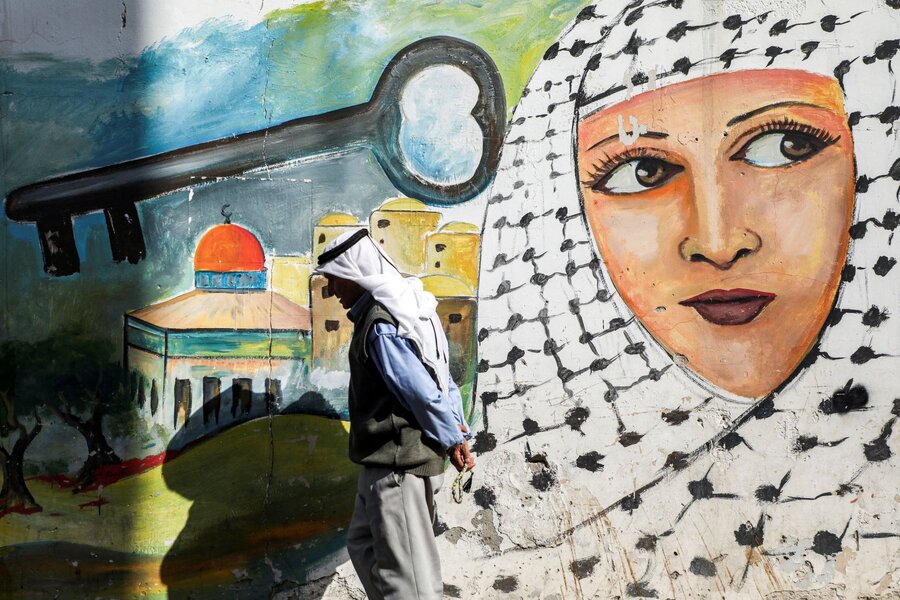 کوفیه و کلید به یاد روز نکبت در فلسطین نقاشی شده است.
