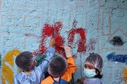 کودکان شمال تهران محله را دیوارنگاری کردند