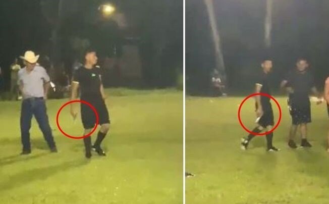عکس | اتفاق عجیب در فوتبال؛ داور روی هواداران حمله ور اسلحه کشید