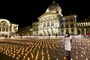 عکس | روشن کردن ۱۱ هزار شمع به یاد قربانیان کرونا در سوئیس