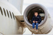 ببینید | بازی کودکان قم با هواپیمای واقعی