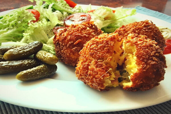 طرز تهیه سیبزمینی پنیری ؛ میان وعدهای جذاب و خوشمزه