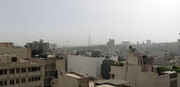 عکس | نمایی از شمال تهران در آلوده‌ترین روز سال | گرد و غبار برج میلاد را محو کرد