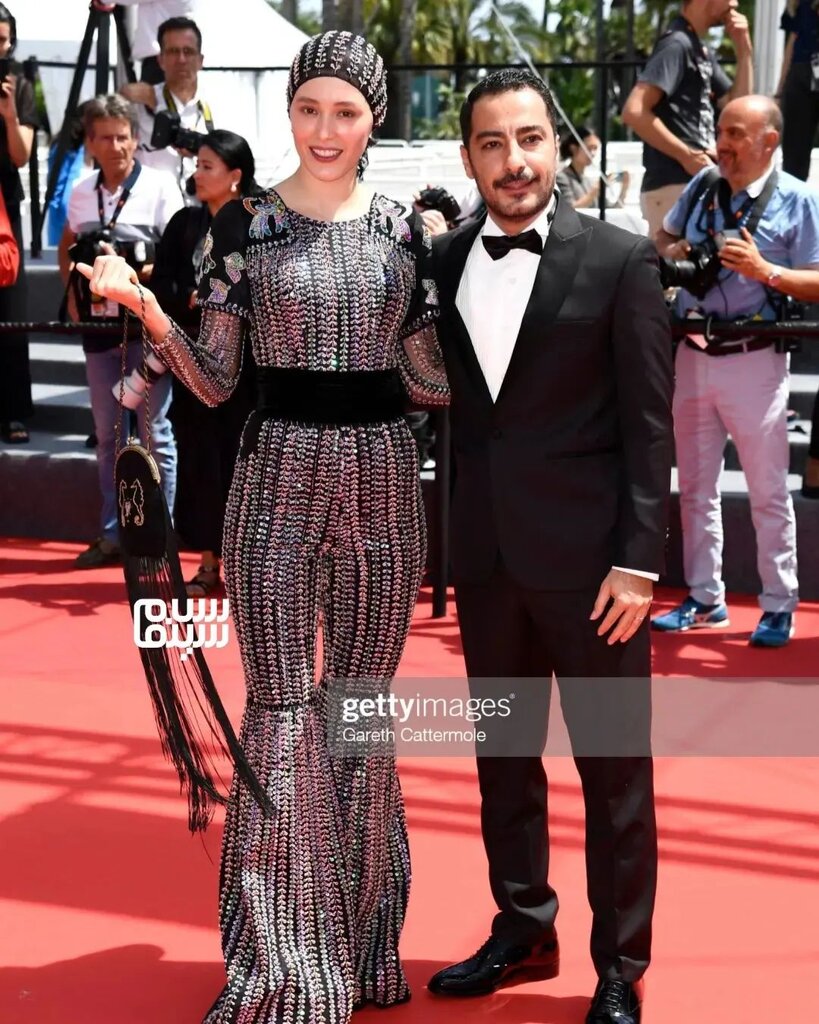 نوید محمدزاده و فرشته حسینی روی فرش قرمز کن