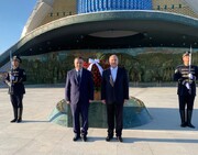 تصویر بازدید قالیباف از نماد استقلال ازبکستان