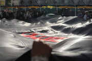 بزرگترین پرچم عزای حسینی کشور در تهران برافراشته شد