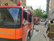 آتش‌سوزی یک مجتمع مسکونی خیابان ولیعصر | ۶۰ نفر نجات پیدا کردند