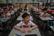خوابیدن دانش‌آموزان سر کلاس | طرحی جالب که در مدارس‌ چین اجرا می‌شود