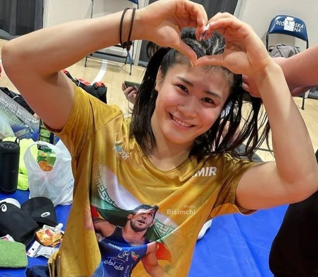 عکس| علاقه کشتی گیر زن قهرمان جهان به پادشاه کشتی ایران/ تصویری که خبرساز شد