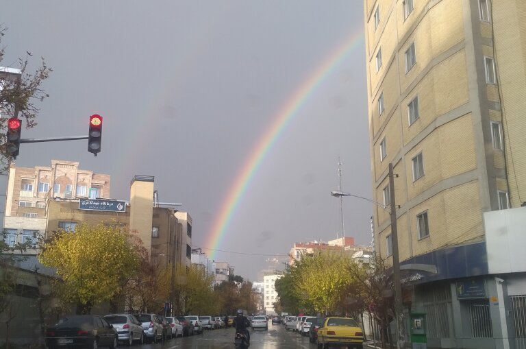 تصاویر اولین باران و رنگین‌کمان پاییزی در تهران