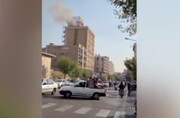 ببینید | وقوع آتش‌سوزی در میدان فردوسی تهران