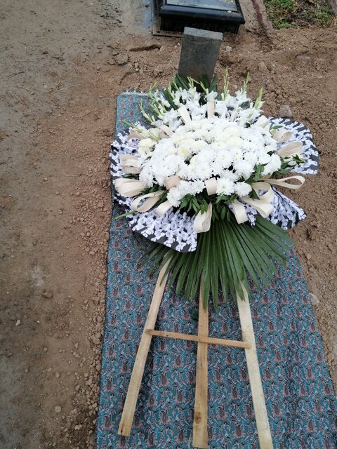 تصاویر | پیکر مفتون امینی زیر باران به خانه ابدی بدرقه شد