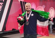 اولین طلای ایران در وزنه بردار قهرمانی جهان | رضا دهدار در حرکت آخر به مدال جهانی رسید!