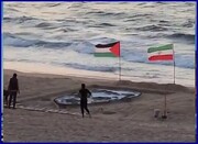 ببینید | تصویر حاج قاسم روی شن‌های ساحل غزه