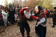 گزارش تصویری |  رقص پاییزی عمونوروز و ننه‌سرما در جنوب تهران!