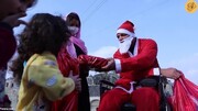بابانوئل جانباز به کودکان چشم انتظار در موصل چه هدایایی داد!