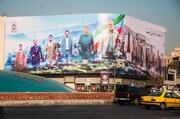 عکس |  بزرگترین دیوارنگاره ایران با تصاویری از شهدا در میدان انقلاب رونمایی شد
