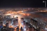 عکس | مه‌گرفتگی برج‌های بلند در یک شهر از نمای بالا