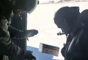 ببینید | توزیع اقلام ضروری توسط بالگردهای ارتش در کوهرنگ محاصره در برف