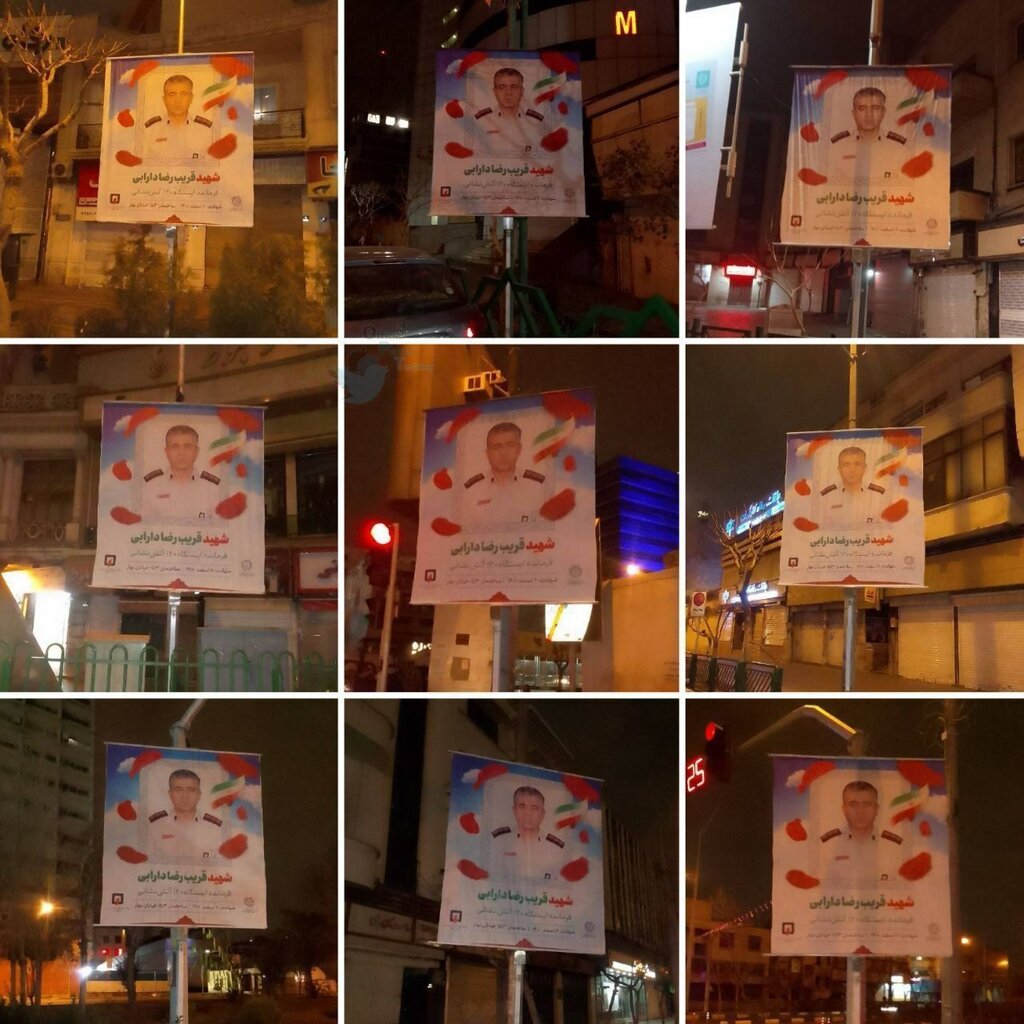 تصاویر | نصب فوری تصاویر شهید آتش نشان رضا دارابی در خیابان‌های تهران