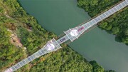 ببینید | سفر به مرتفع‌ترین و طویل ترین پل معلق شیشه‌ای جهان