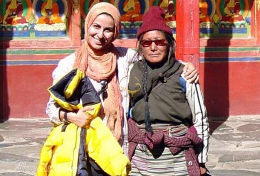 این زن با دوچرخه به دور دنیا سفر کرد | جهانگردی برای کمک به کودکان یتیم مناطق محروم  