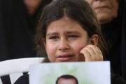 تصاویر | دختر شهید ربیعی در غم از دست دادن پدر