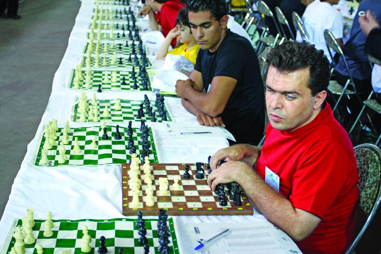 رُخ به رُخ با ۵۰۰ نفر  |‌ بازخوانی روزی که شطرنج باز ایرانی رکورد گینس را شکست

