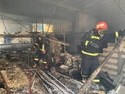 تصاویر آتش‌سوزی ساختمان نیمه‌کاره در شمال‌ غرب پایتخت | گرفتار شدن ۵ کارگر در طبقه منفی ۵