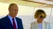 تصاویر تذکر پوتین به یک زن هنگام پخش سرود ملی روسیه