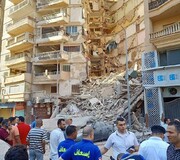 ببینید | فروریختن ساختمان ۱۳ طبقه در مصر | تلاش برای نجات زیر آوارماندگان