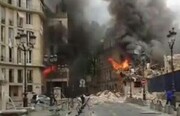 ببینید | لحظه ریزش یک ساختمان در فرانسه در اثر آتش سوزی در اعتراضات مردمی