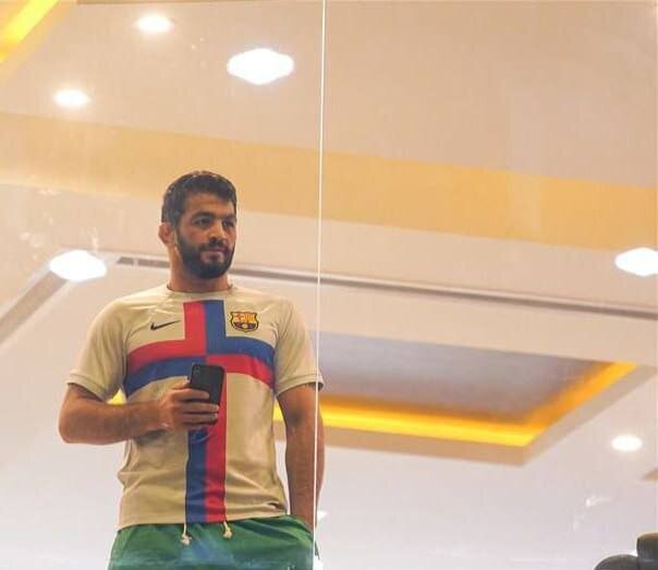 عکس| حسن یزدانی لو داد! | تیم  فوتبال مورد علاقه پادشاه کشتی ایران