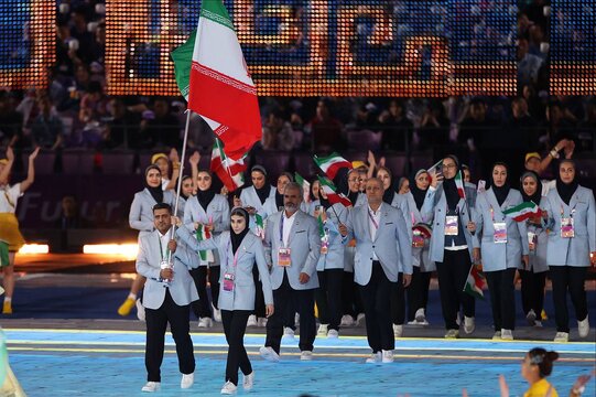تصاویر دیدنی از لحظه رژه کاروان ایران در افتتاحیه بازی‌های آسیایی هانگژو ؛ لباس زیبای ورزشکاران ایران