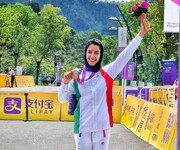 تصاویر پوشش و حجاب نخستین بانوی مدال آور ایرانی در رشته دوچرخه سواری