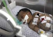 تصاویر نوزاد مجروح در بیمارستان غزه که کسی از زنده بودن پدر و مادرش خبر ندارد