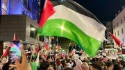 ببینید | پرچم فلسطین روی دوش خبرنگار العالم در لندن