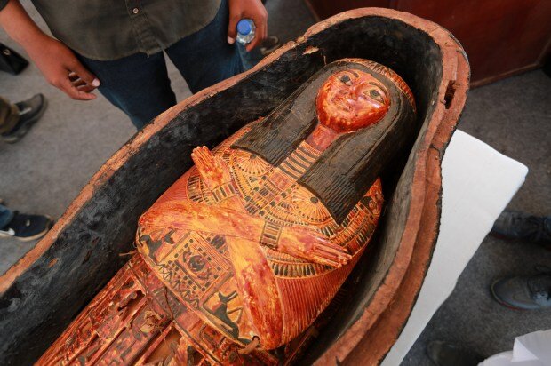 Photo  The discovery of the 3400-year-old book of the dead and mummies of ancient Egypt  Ancient tombs, talismans and precious objects