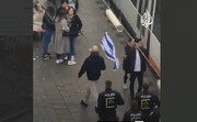 تصاویر راهپیمایی تک نفره در حمایت از اسرائیل با اسکورت ۴ پلیس!