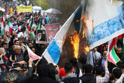 تصاویر | به آتش کشیدن پرچم آمریکا و اسرائیل در راهپیمایی ۱۳ آبان