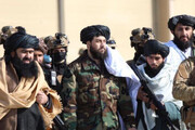 تصویر عجیب یکی از محافظین وزیر دفاع طالبان | استفاده از پوشش سخنگوی حماس!