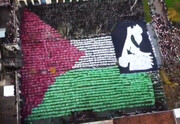 ببینید | اقدام خلاقانه اسپانیایی ها در حمایت از مردم فلسطین | تابلوی گرنیکا و پرچم فلسطین در کنار یکدیگر