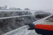 تصاویری عجیب از یخ زدگی سیم برق در روسیه!