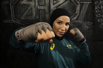 تاریخسازی دختر بوکسور ایران با پرچم استرالیا! | اولین زن محجبه به المپیک رسید