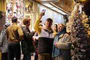 تصاویری دیدنی از خرید کریسمس در آستانه سال نو میلادی در تهران