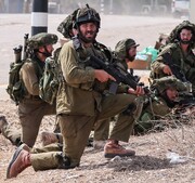 تصاویر حمله سرباز اسرائیلی به کودک تنهای فلسطینی